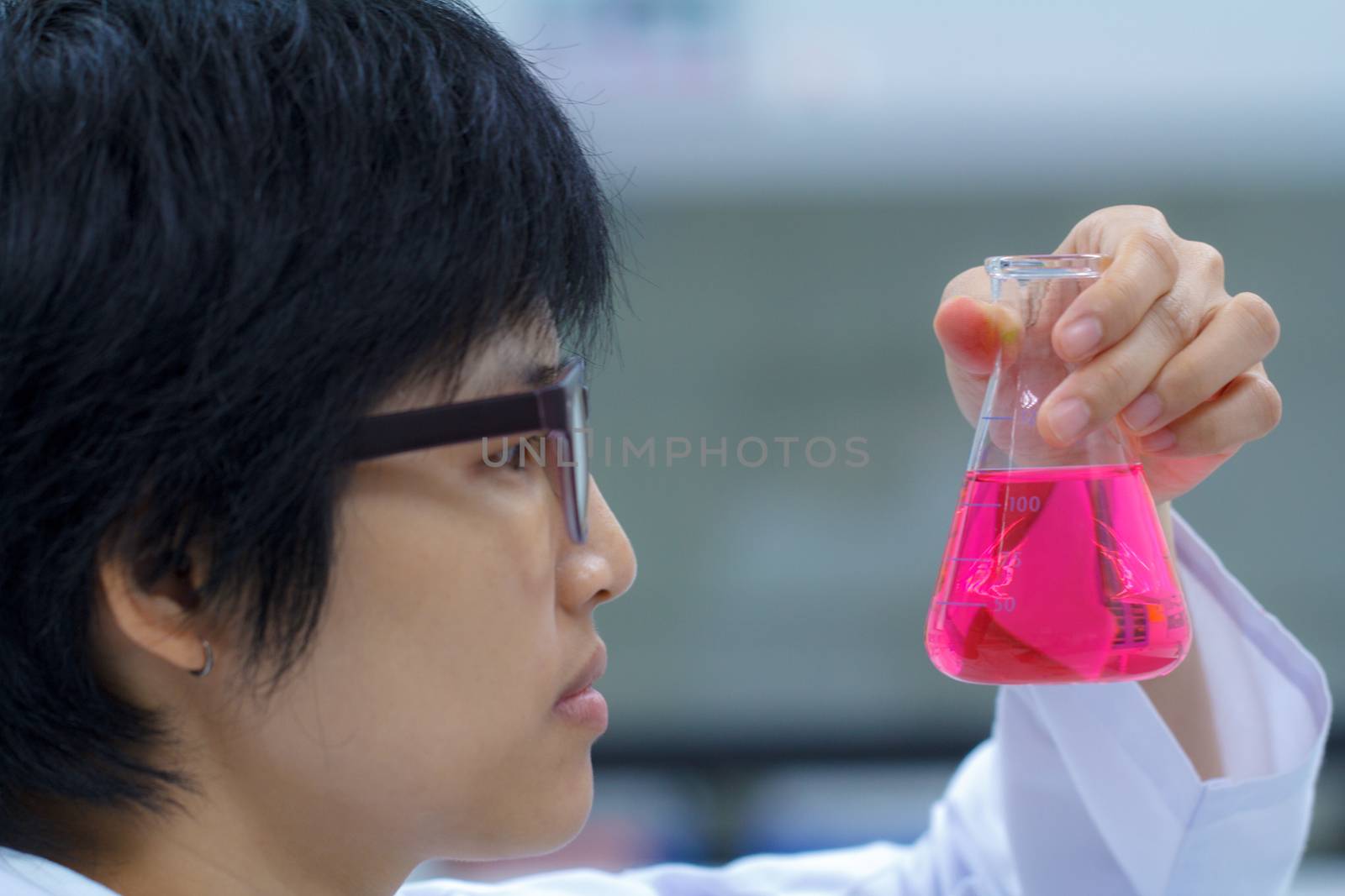 Researcher working with chemical