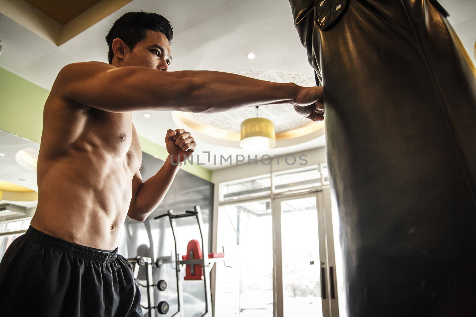 Man performs exercise - Boxing