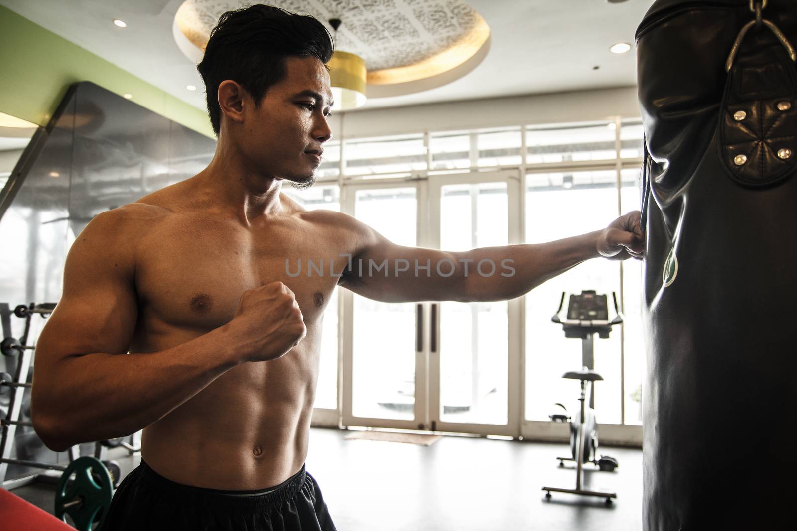 Man performs exercise - Boxing