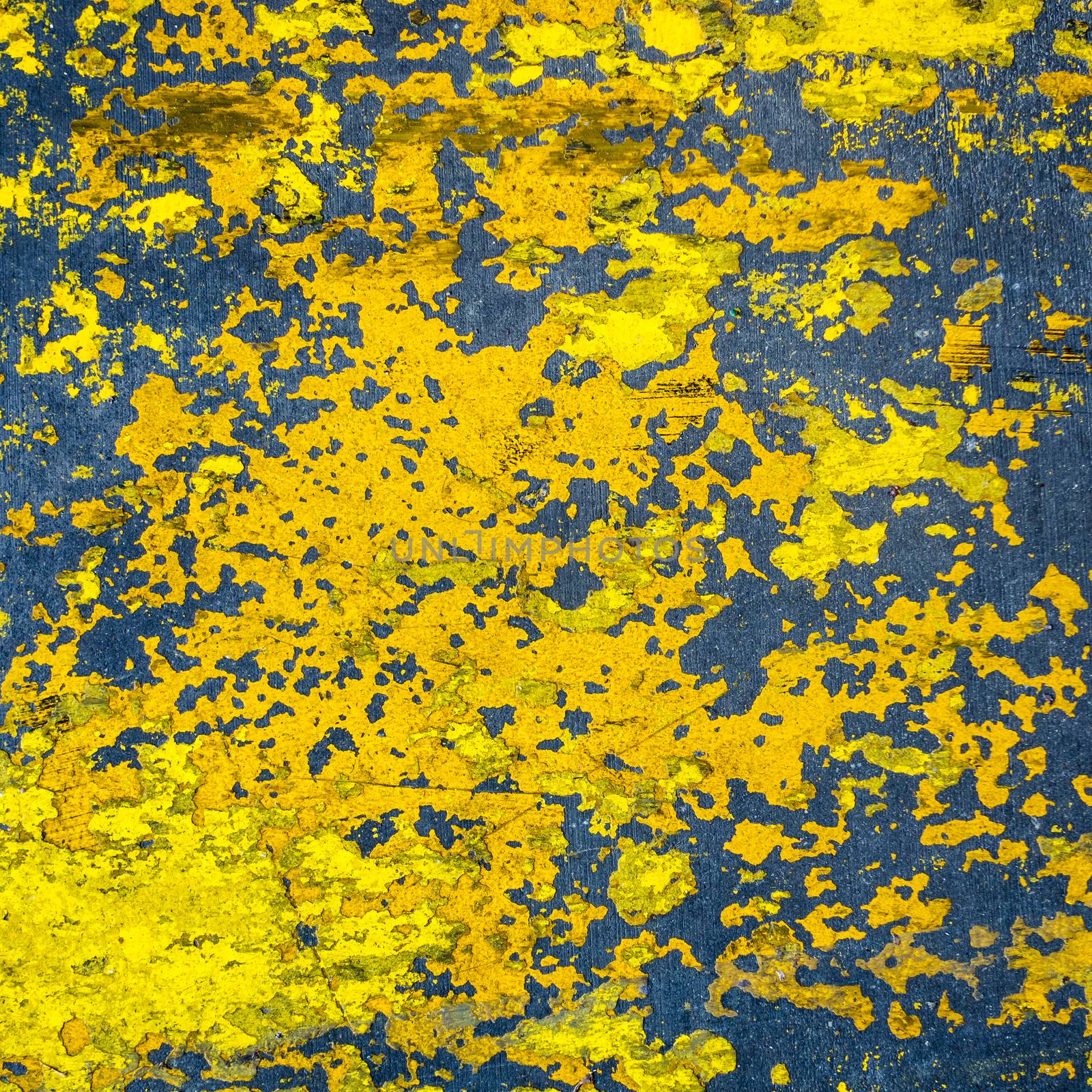 Yellow painted cement floor by dutourdumonde