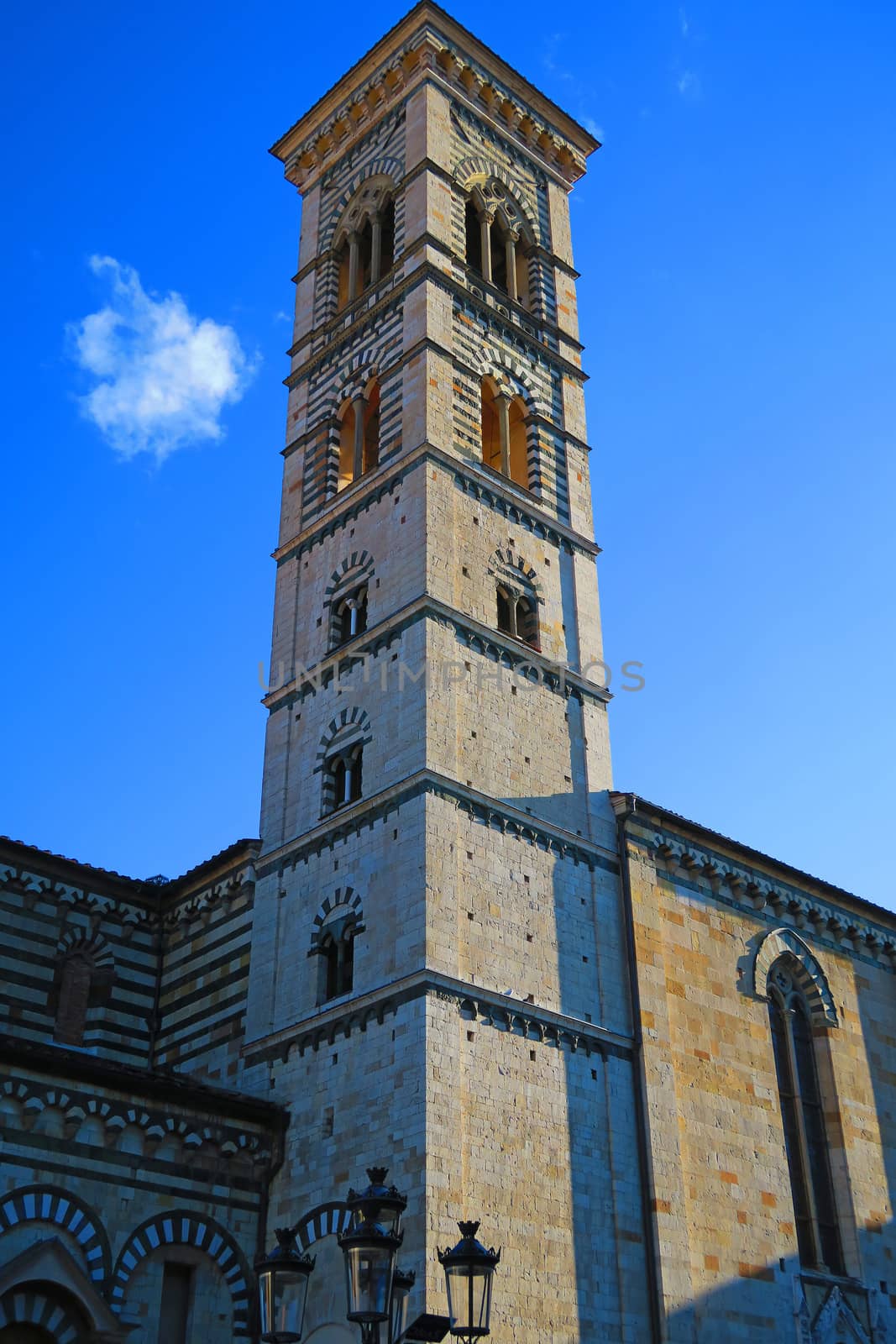 Prato,Italy,11 october 2015.Bell tower of the twelfth century of  Prato Cathedral.The church is dedicated to Saint Stephen, the first Christian martyr. It is one of the most ancient churches in the city, and was already in existence in the 10th century. It was built in several successive stages in the Romanesque style. The church contains a number of notable works of art, in particular fine sculpture. During the 14th century the cathedral acquired an important relic, the Sacra Cintola or Belt of the Holy Virgin.