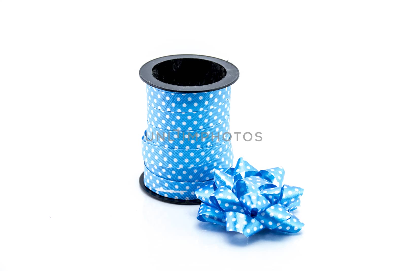 blue satin gift bow. Ribbon. Isolated on white by teerawit