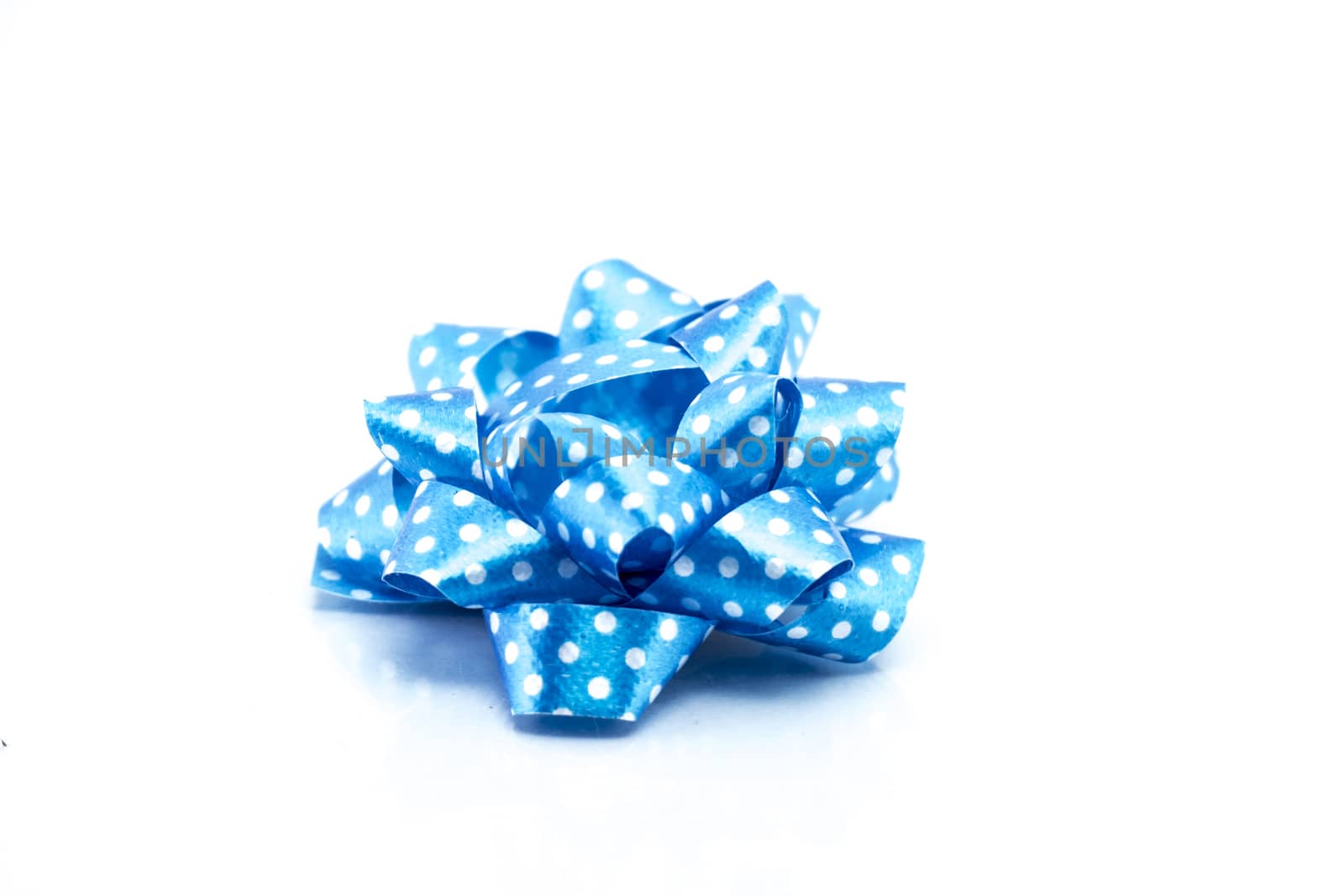 blue satin gift bow. Ribbon. Isolated on white, christmas object