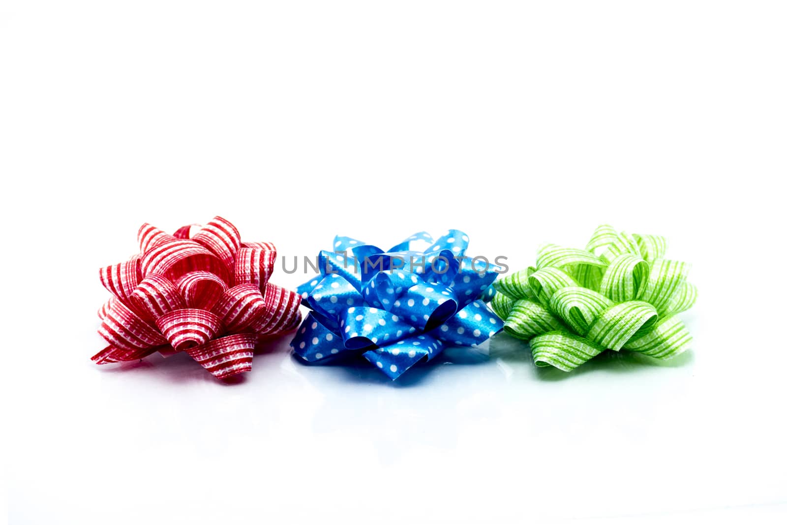 Set of ribbon satin bows isolated on white background, christmas objects