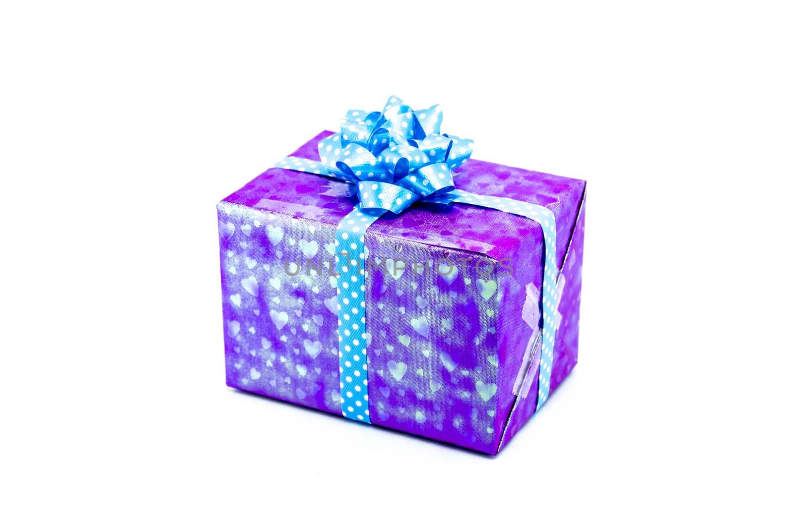 purple gift box with blue ribbon bow, isolated on white