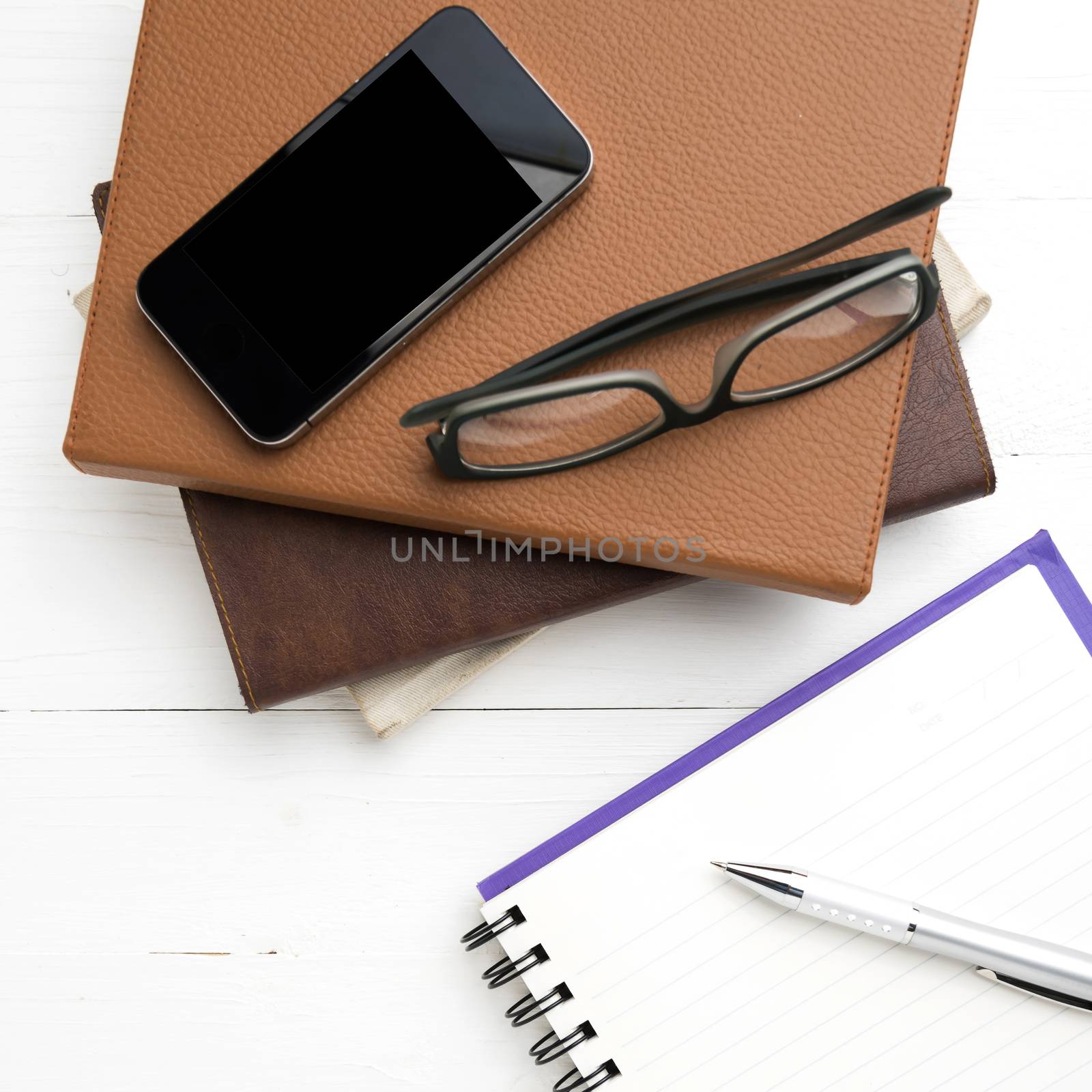 notepad with stack of book by ammza12