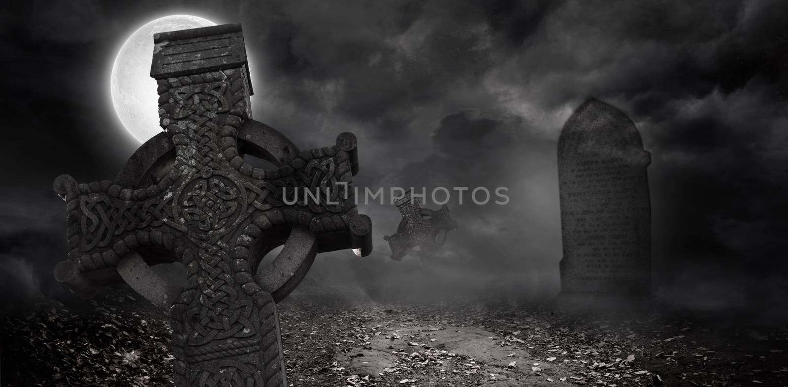 Graveyard under the full moon by Wavebreakmedia