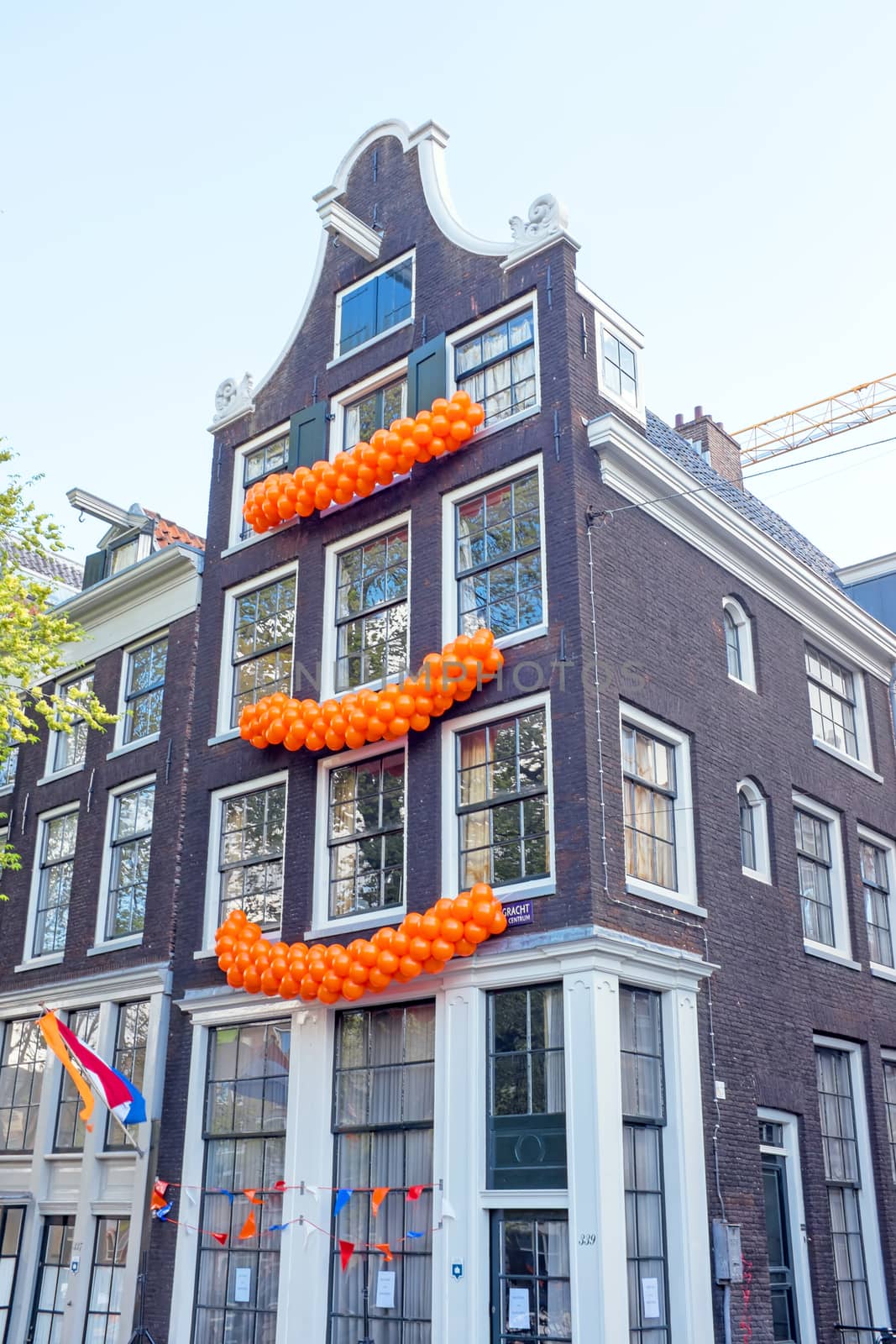 Traditional dutch house decorated on Kings day in Amsterdam the Netherlands