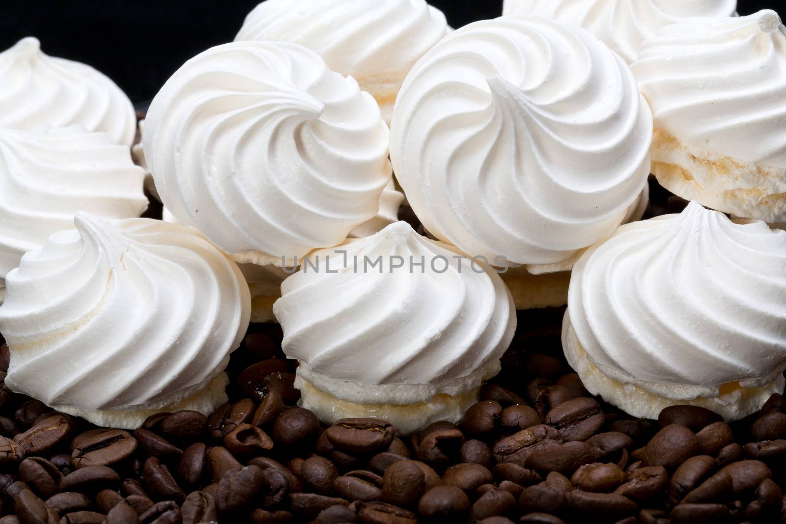 French vanilla meringue cookies and  coffee beans