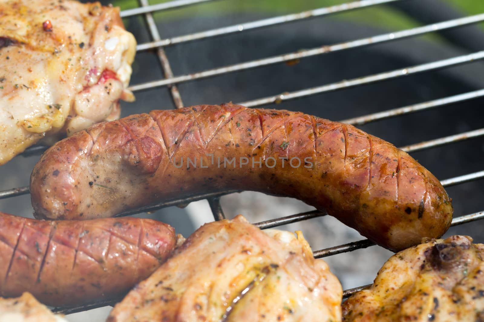 barbecue with delicious grilled meat on grill 