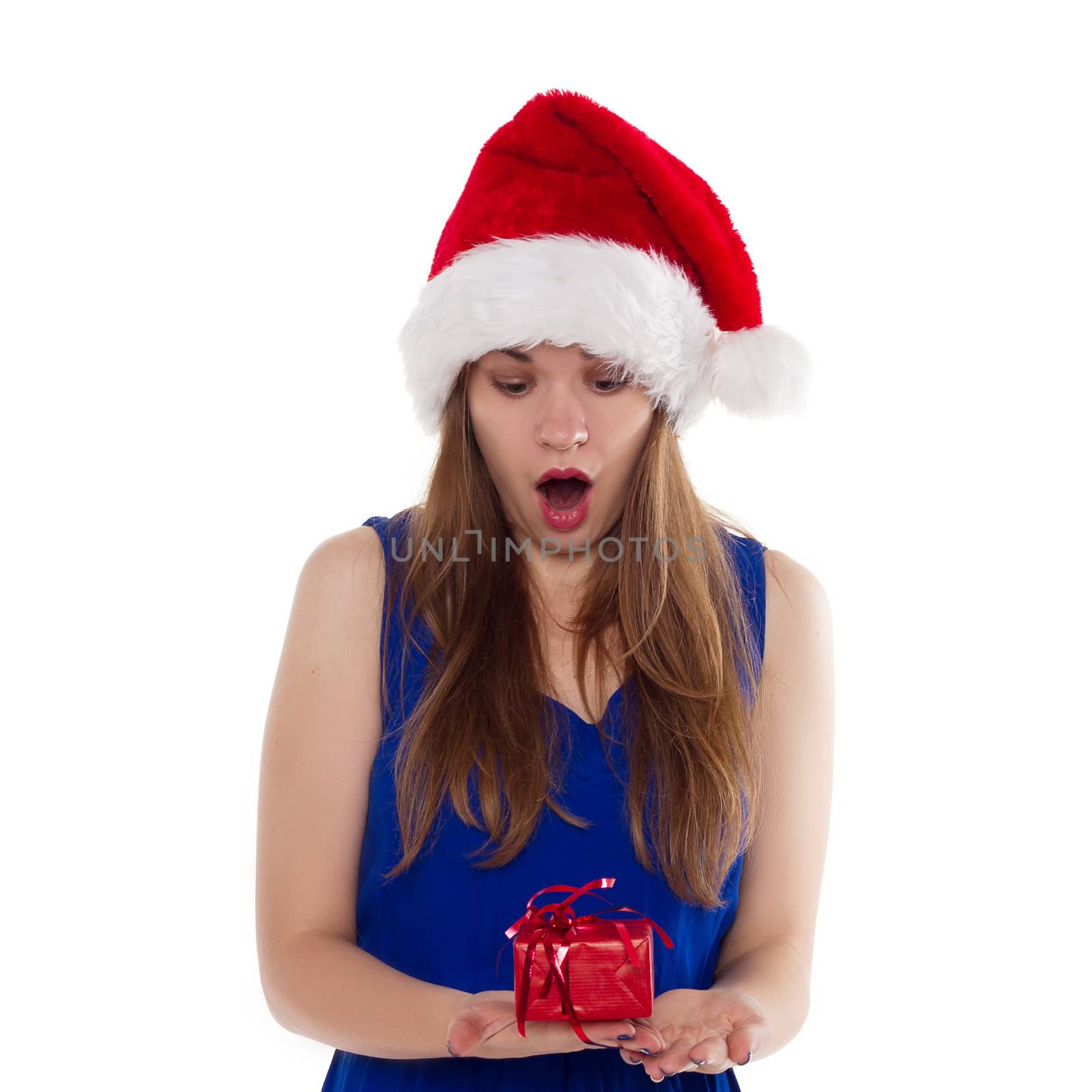 Girl in Christmas hat gift upset. On a white background. isolate