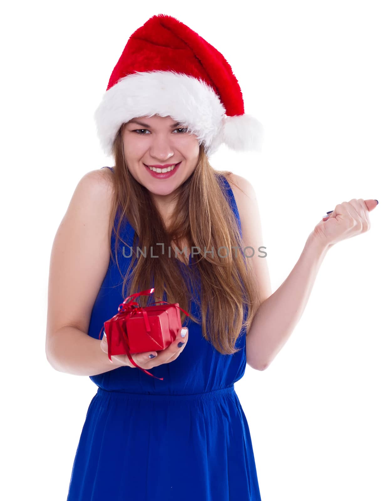 girl in a Christmas cap gift to rejoice on white background.