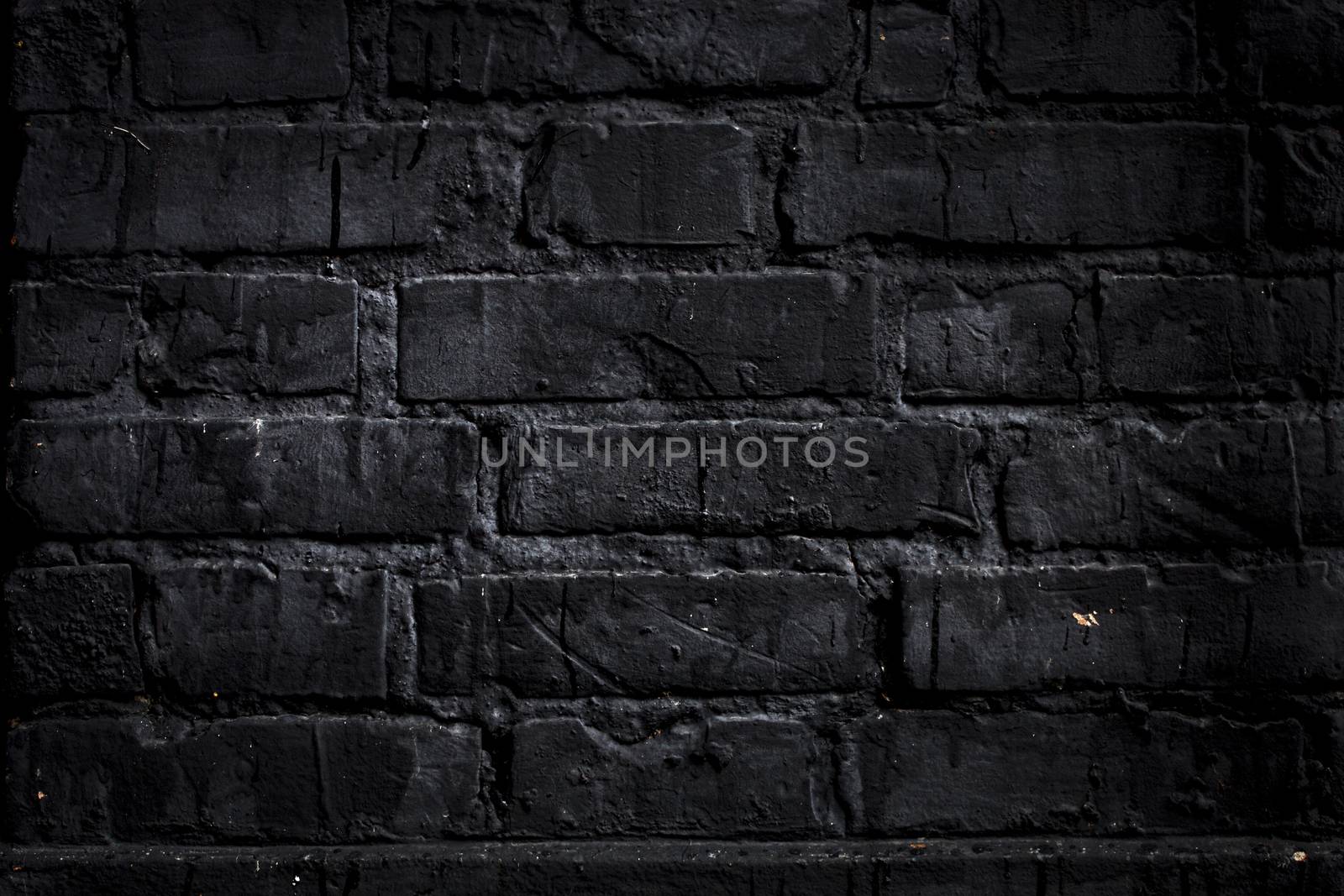 Black brick wall by ints