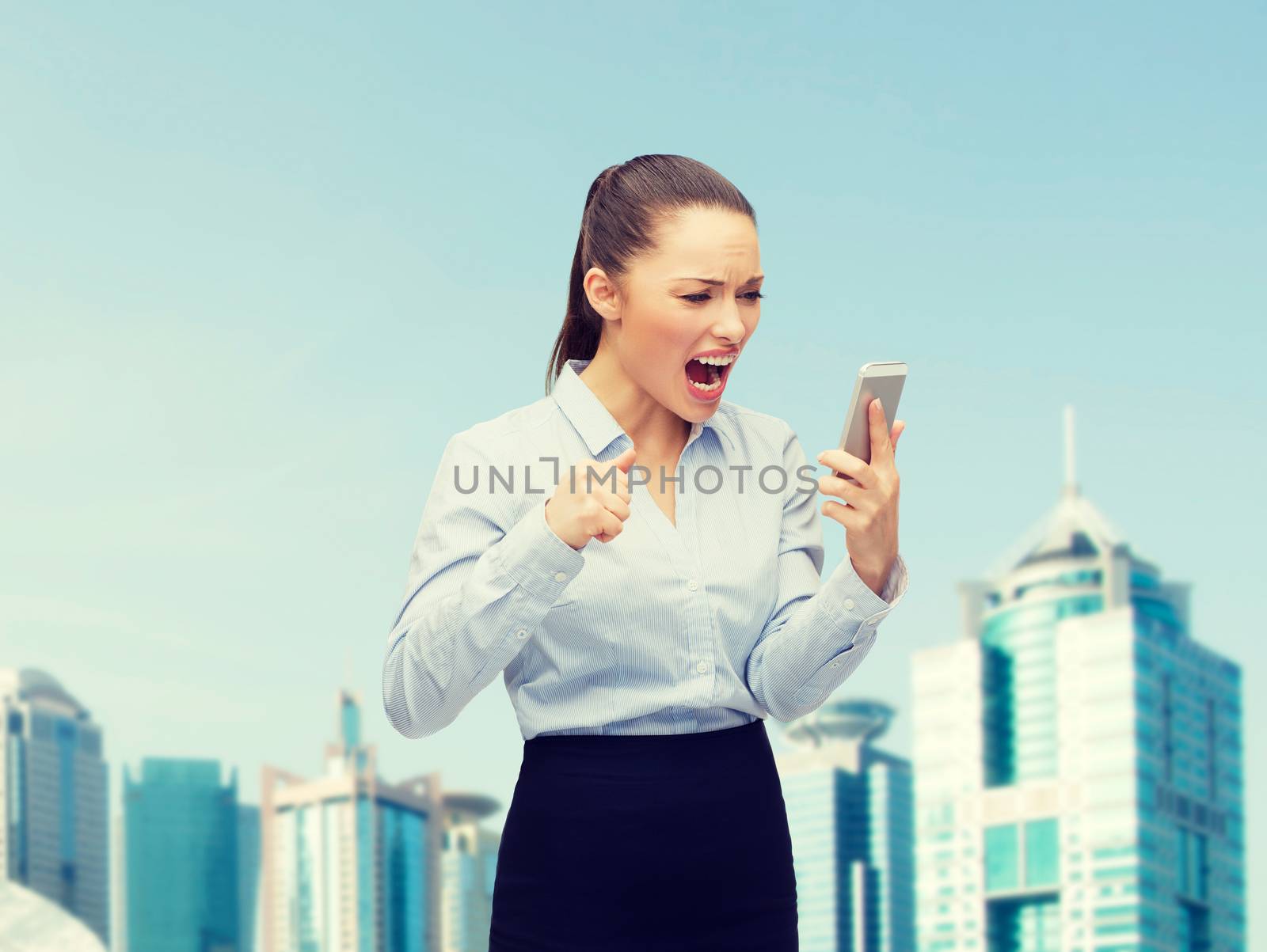 screaming businesswoman with smartphone by dolgachov