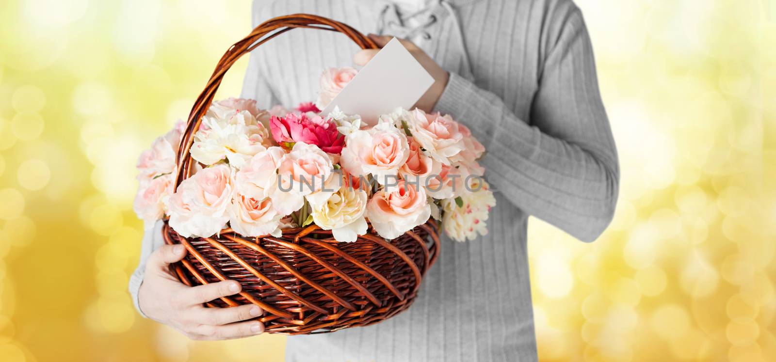 man holding basket full of flowers and postcard by dolgachov