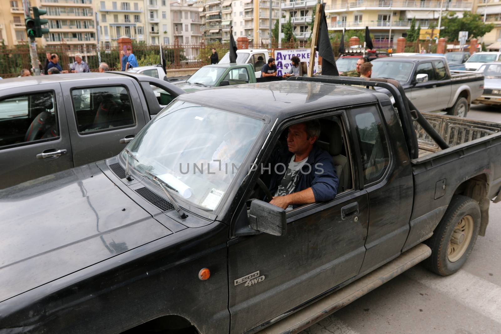GREECE, Thessaloniki: Greek farmers take their pickup trucks to the streets of Thessaloniki, Greece's second largest city, on October 15, 2015 to protest against the government's planned tax increases for the agricultural sector. The tax hike was agreed to as part of the most recent bailout deal to end the country's economic crisis. A similar protest was held in the Greek capital of Athens.