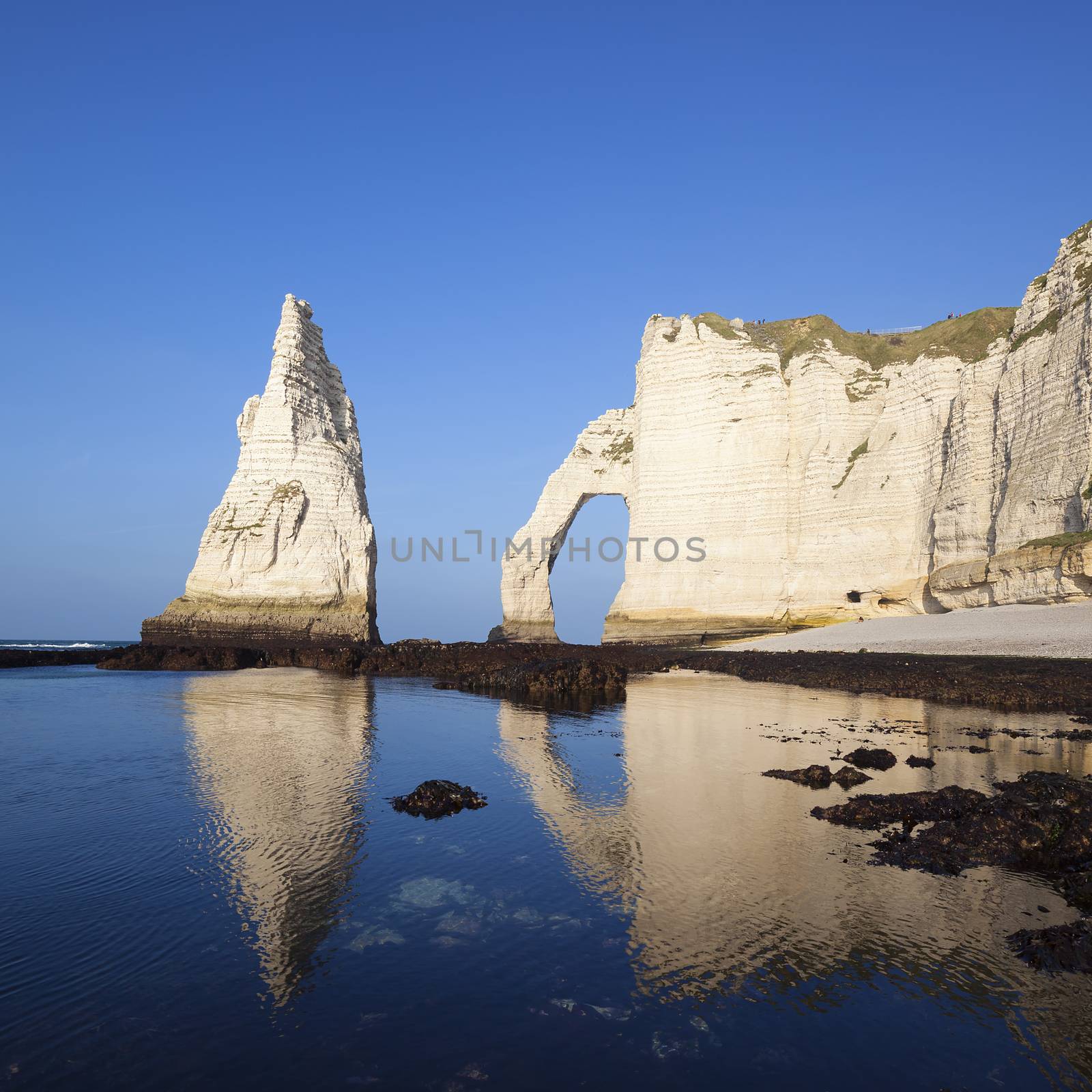 View of Etretat Aval cliff and blue ocean. Normandy, France, Europe.