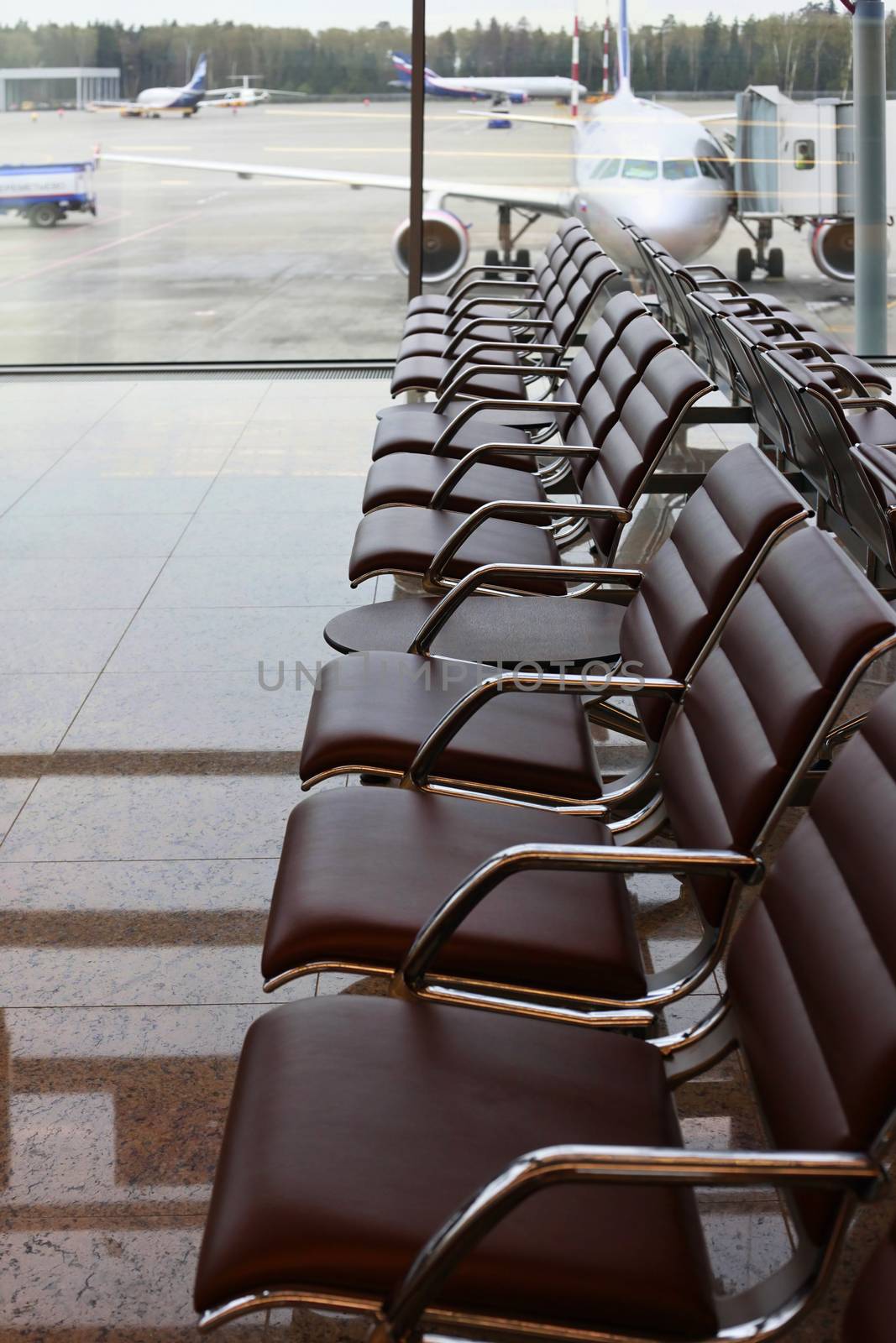 Chairs in a row at airport waiting room