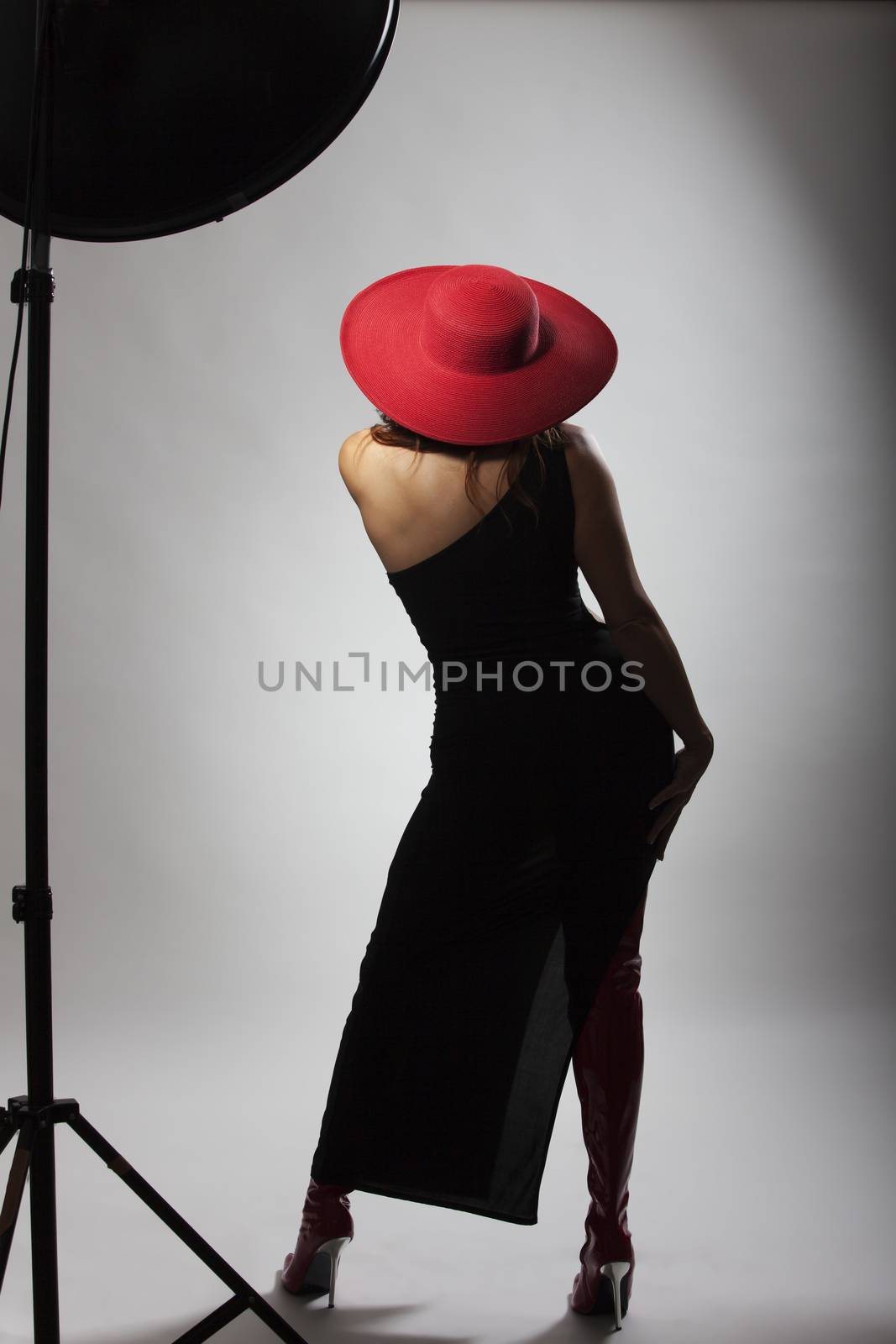 woman with a red hat from behind