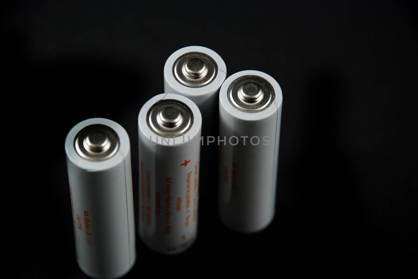 isolated pictores of electrical batteries on black background