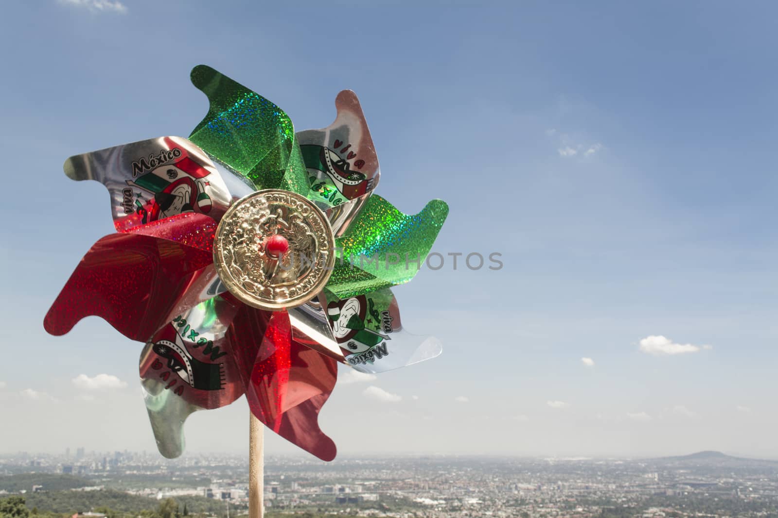 Mexican Rehilete memorial to September 15. Background can appreciate valley of Mexico and the blue sky with clouds
