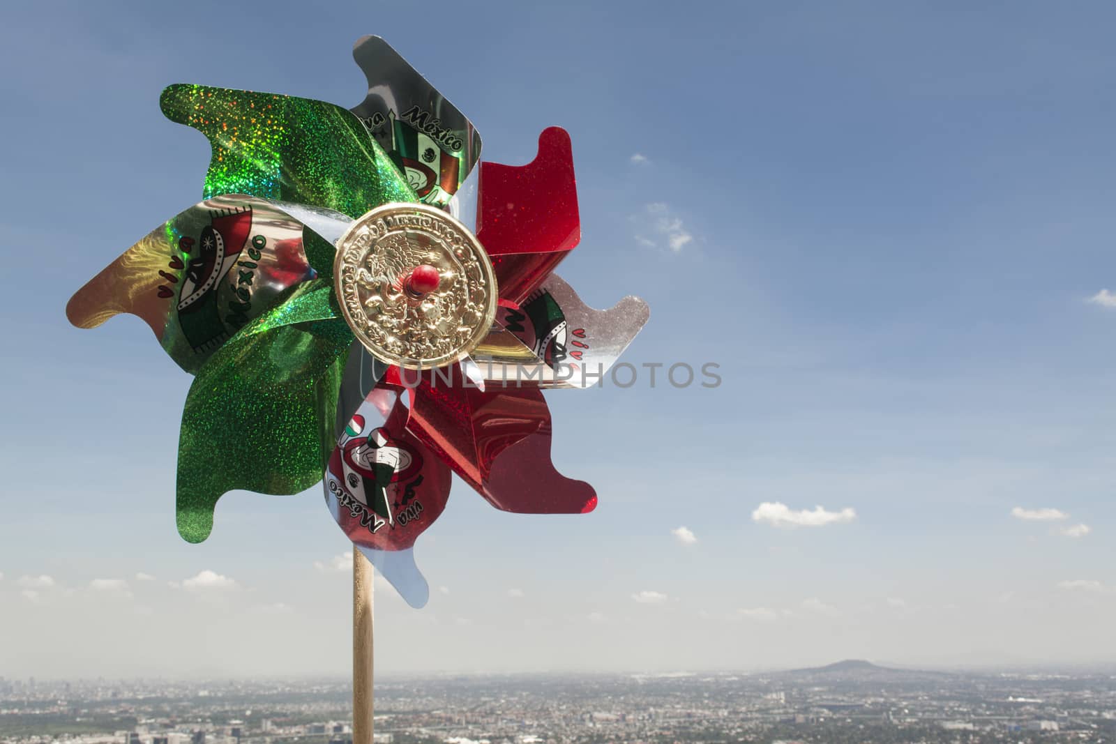Mexican Rehilete memorial to September 15. Background can appreciate valley of Mexico and the blue sky with clouds