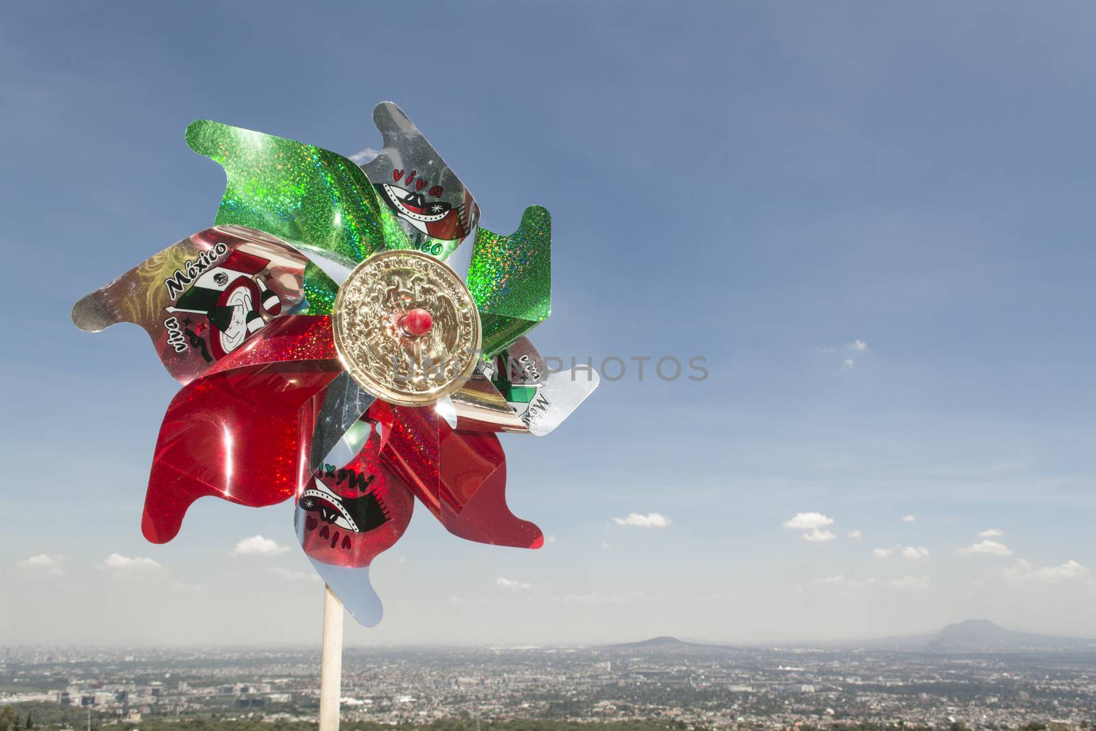 Mexican Rehilete memorial to September 15. Background can appreciate valley of Mexico and the blue sky with clouds