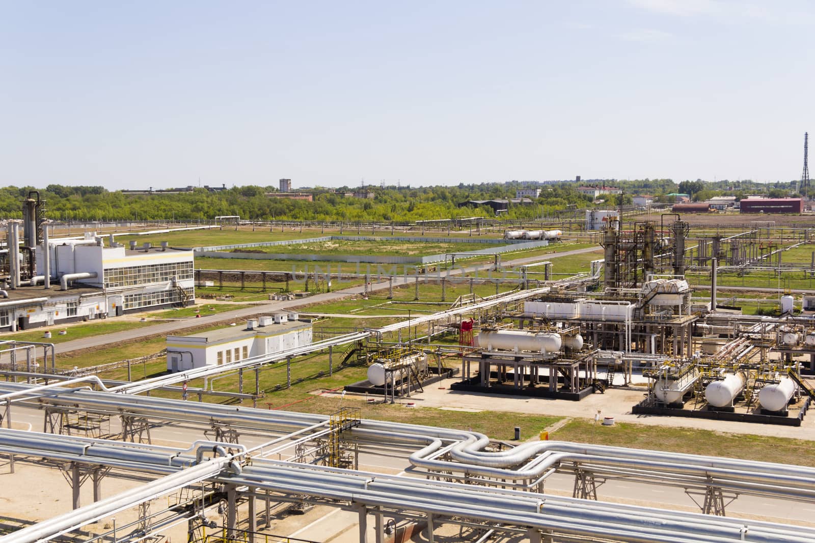 Industrial landscape of refinery at summer day