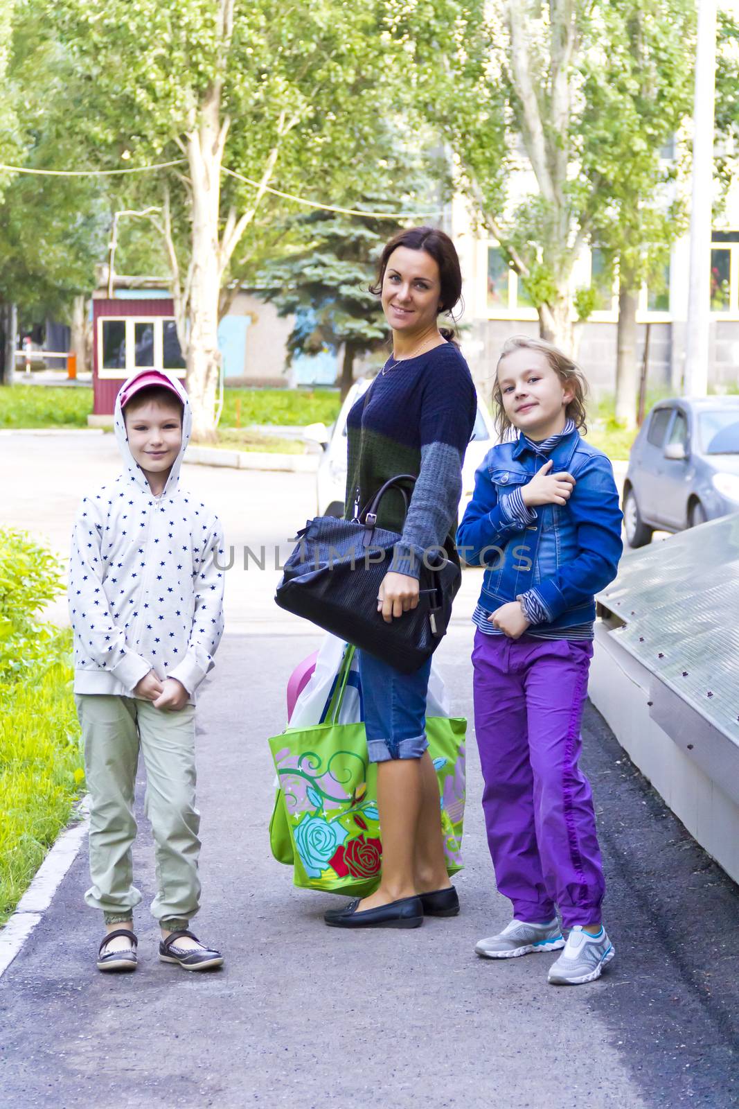 Photo of woman with two girls after swimming pool