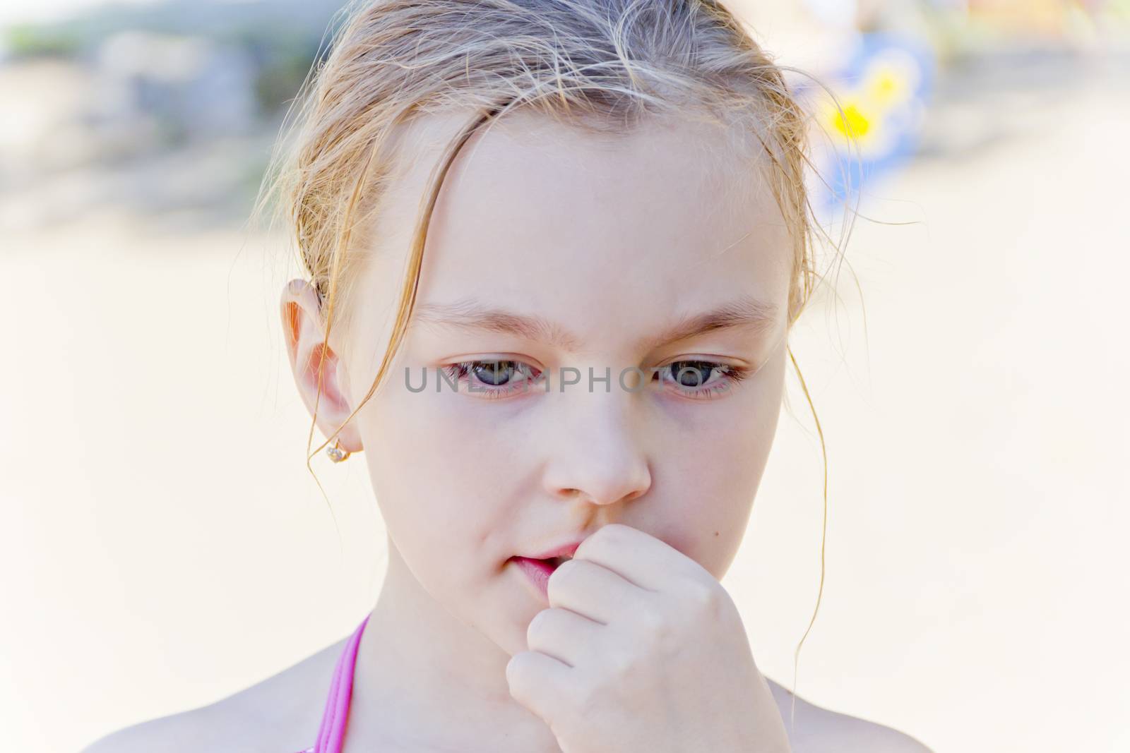 Portrait of cute girl with blond hair