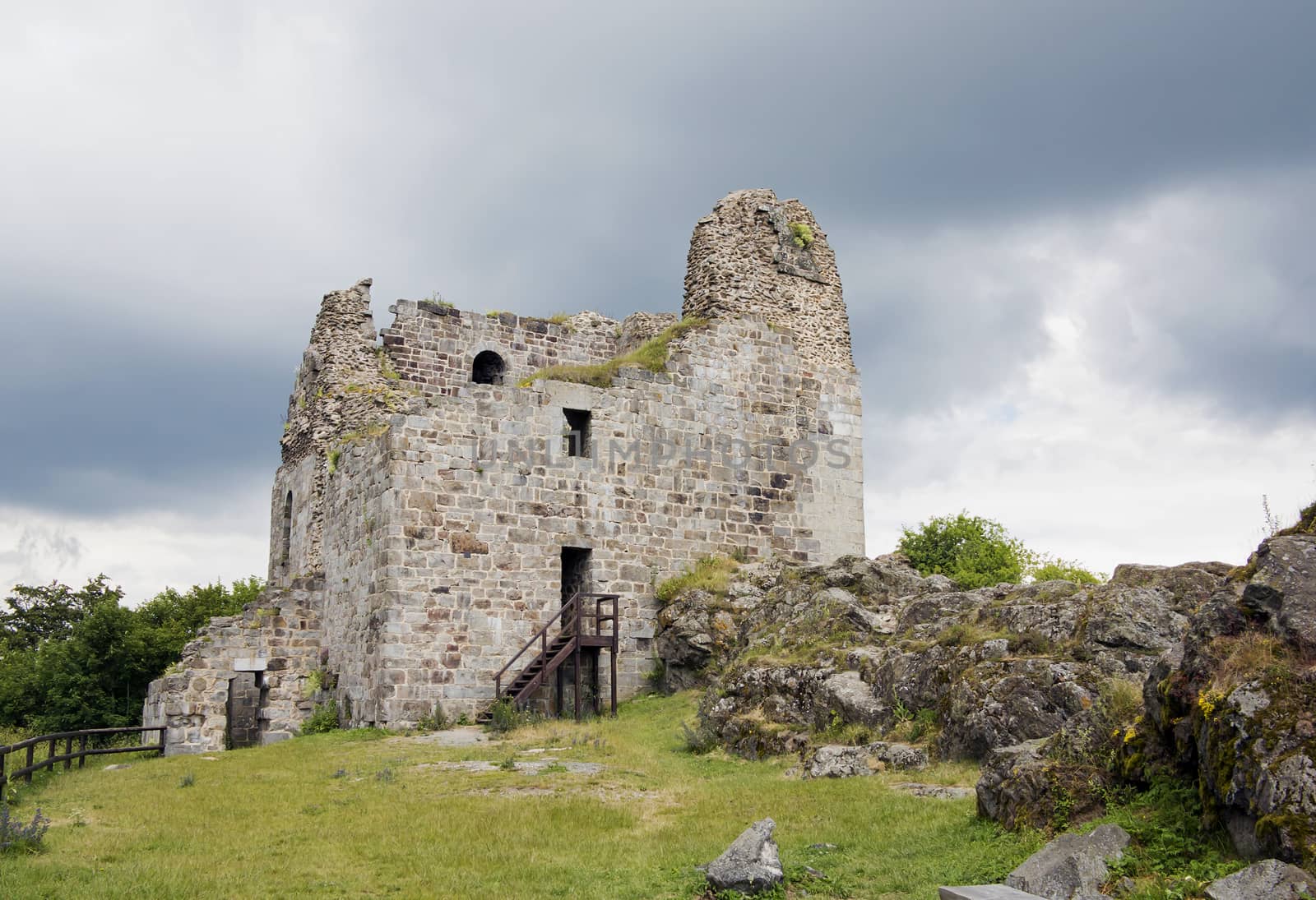 Primda castle - the one from the oldest stone castles in Czech republic.
The first mention of Primda castle dates from the year 1121.
The ruins of the castle Primda stands at the southern end of the rocky ridge above the Primda village on Tachov Region. Primda is considered to be the oldest surviving stone castle in Bohemia and is protected as a national monument. The castle has been preserved ruins of a massive rectangular Romanesque residential tower, which was built of quarried stone. Also there are remains of a cylindrical tower from the late 15th century.
Primda, Czech republic.