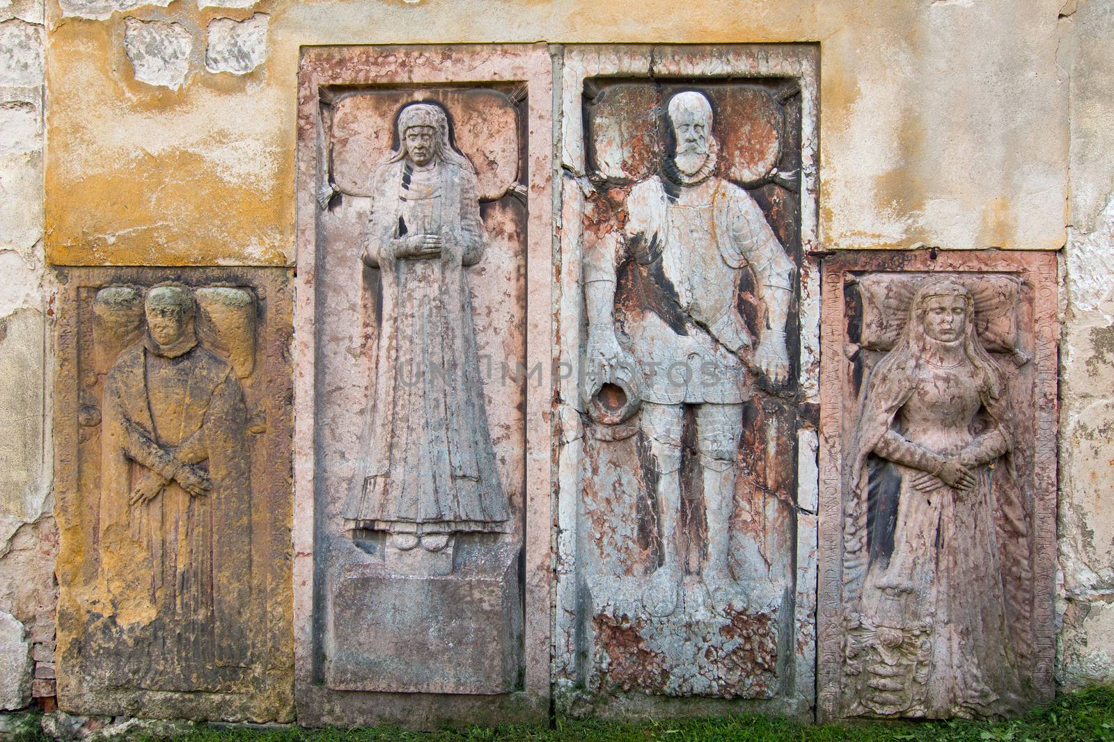 Renaissance tomb in the wall of the church by Mibuch