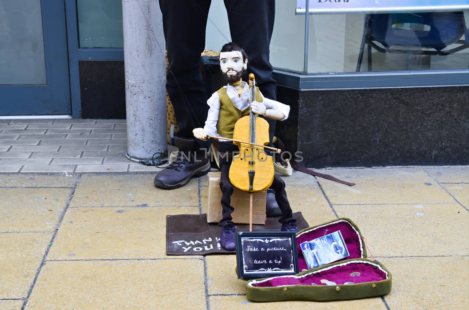 Street band play in York UK, music promotion, tourist attraction, the way to make money, editorial photo.