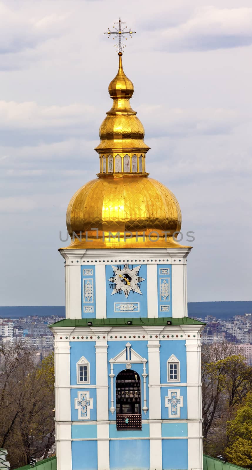 Saint Michael Monastery Cathedral Tower Golden Domes Kiev Ukraine.  Saint Michael's is a functioning Greek Orthordox Monasatery in Kiev.  The original monastery was created in the 1100s but was destroyed by the Soviet Union in the 1930s.  St. Michaels was reconstructed after Ukrainian independencein 1991 and reopened in 1999.