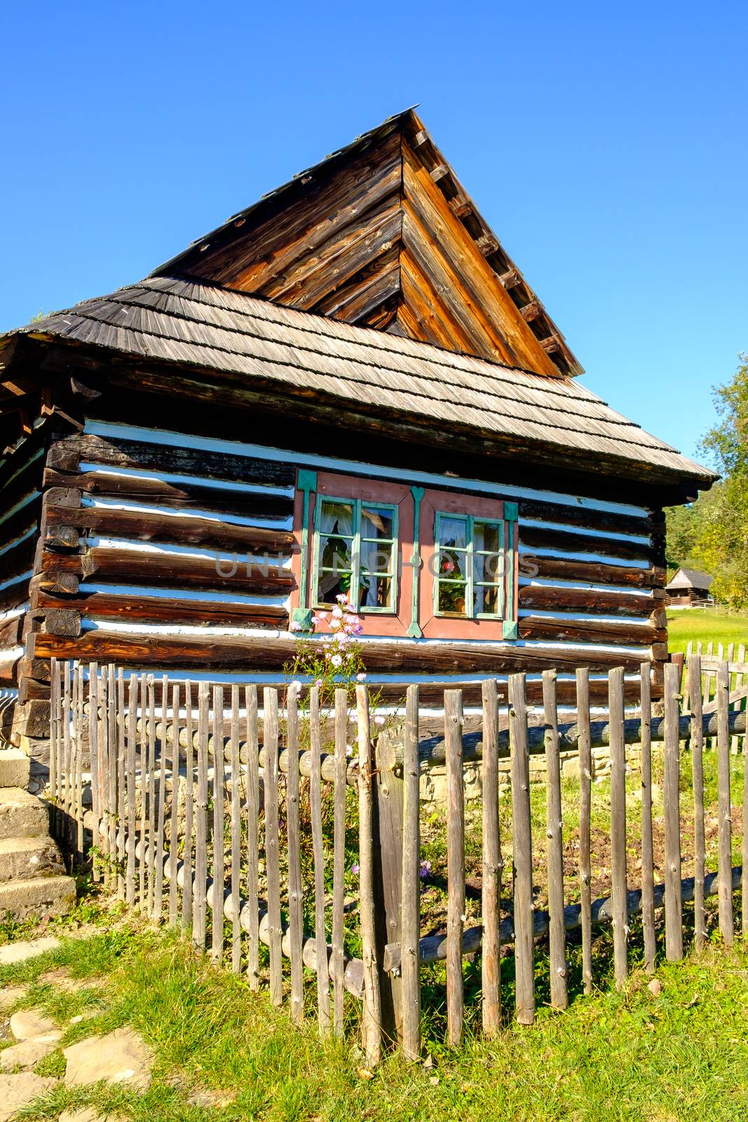 Detail of old traditional colorful wooden house, located in open air museum (skanzen) Stara Lubovna, Slovakia