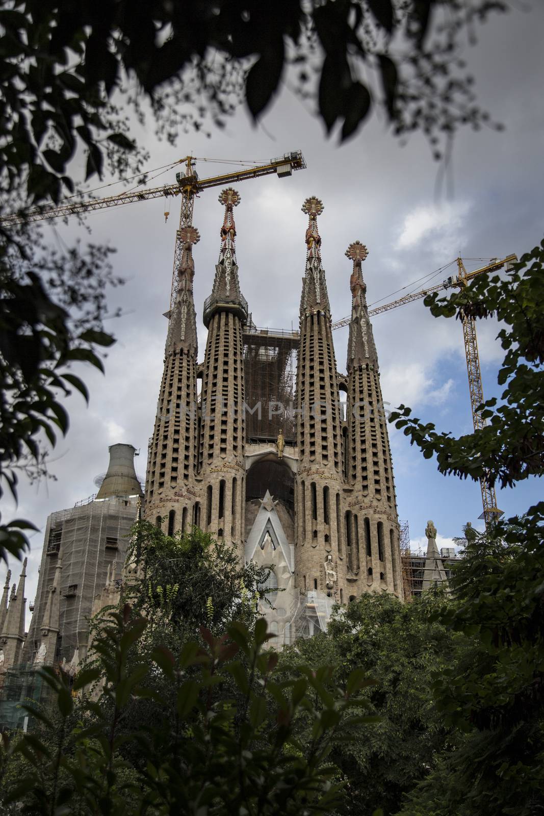 Barcelona, Spain - September 19, 2015: Sagrada Familia Passion facade side. Gaudi's profound catholicism inspired his designs of Sagrada Familia.