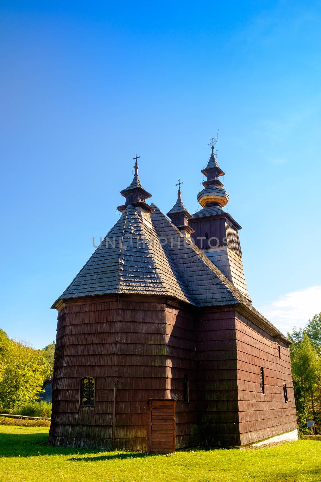 Scenic view of old traditional Slovak wooden church in open air museum (skanzen) Stara Lubovna, Slovakia