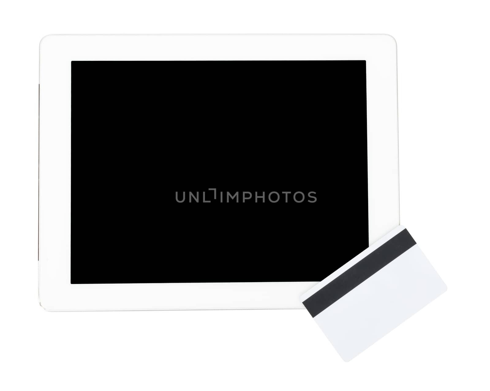 Tablet with credit card on isolated white background