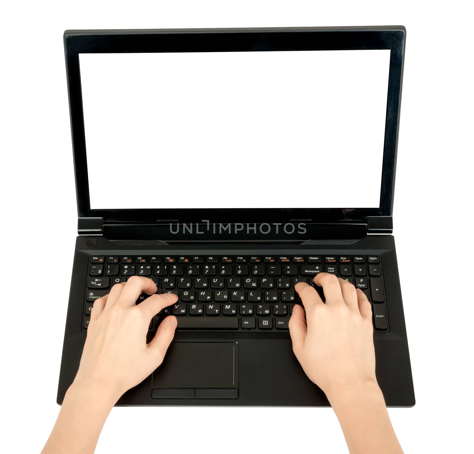 Humans hand working on laptop on isolated white background, top view