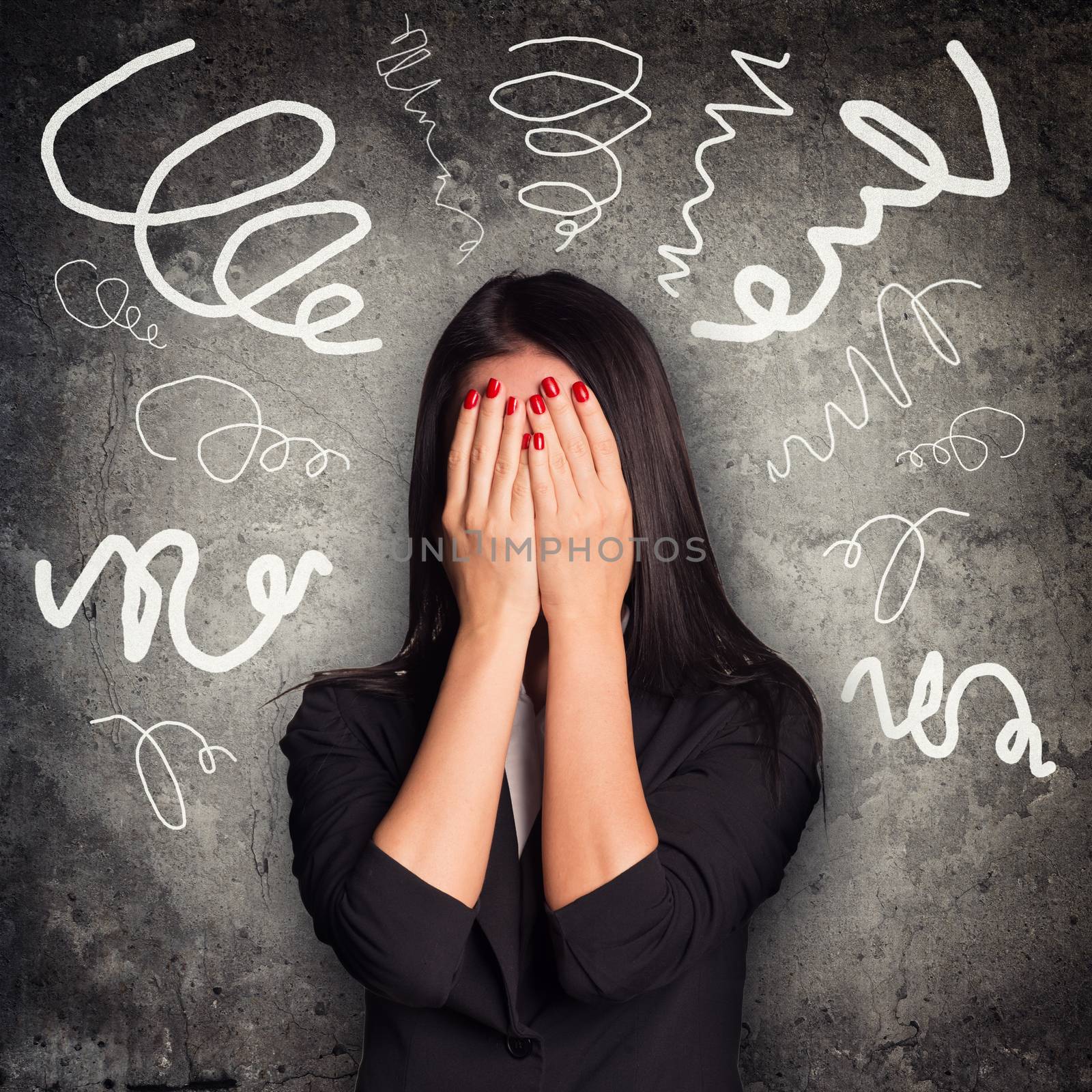 Woman close face within hands on abstract background