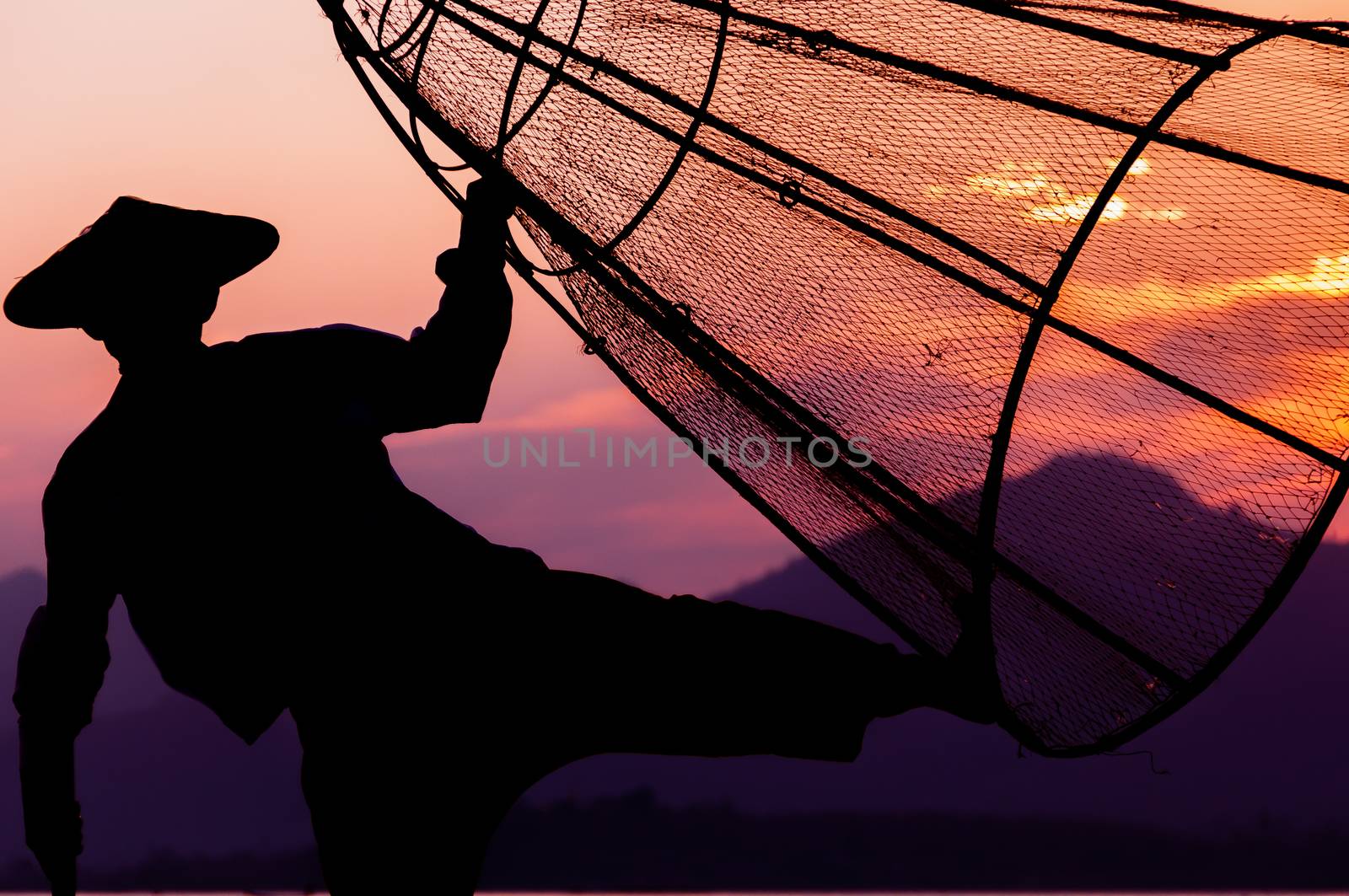 Inle Lake Fisherman is fishing in the last fish for the day