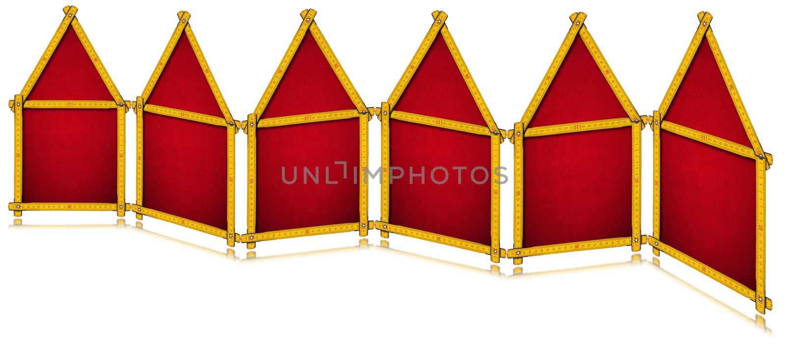 Six wooden yellow rulers in the shape of houses. Isolated on white background with reflections