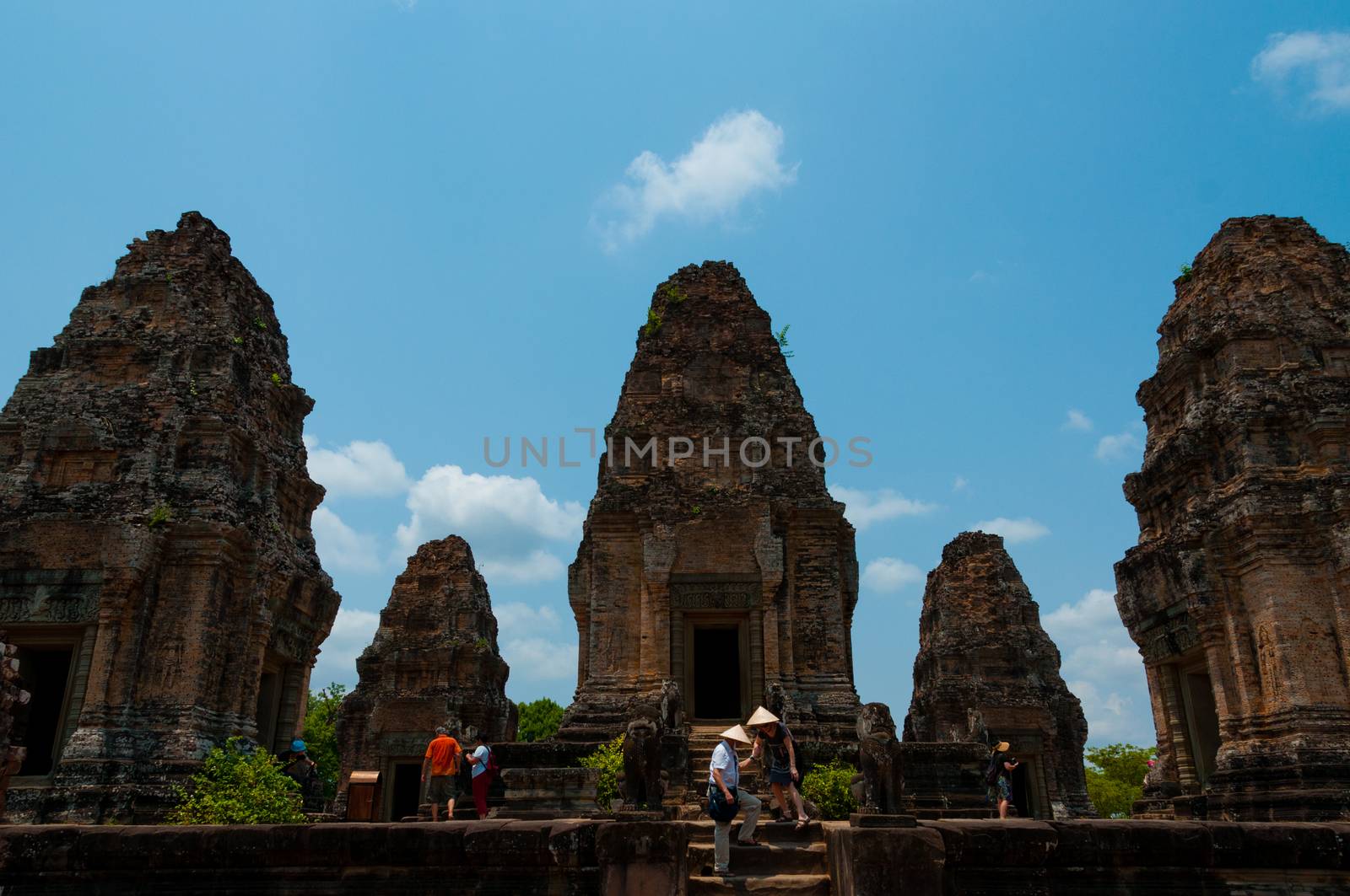 Five stone temples with people at Angkor Wat