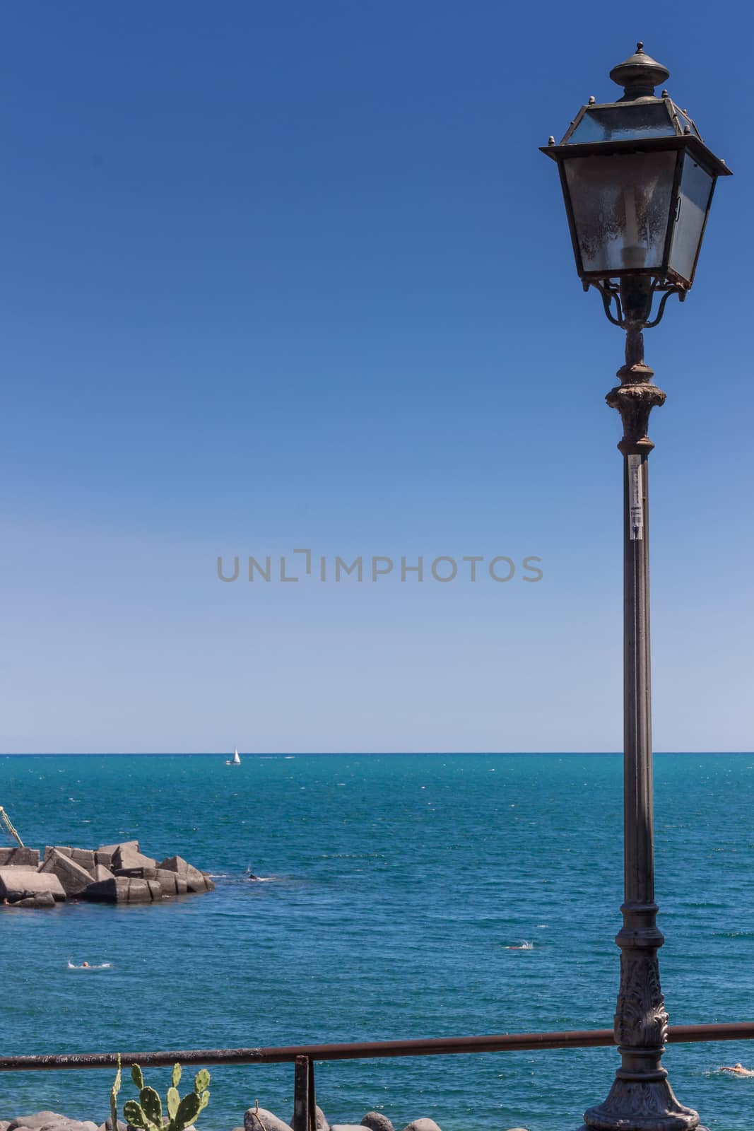 The street lamp on mediterranean sea background