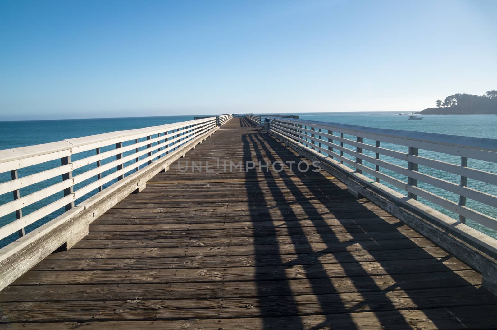 California coastal pier leads to horizon
