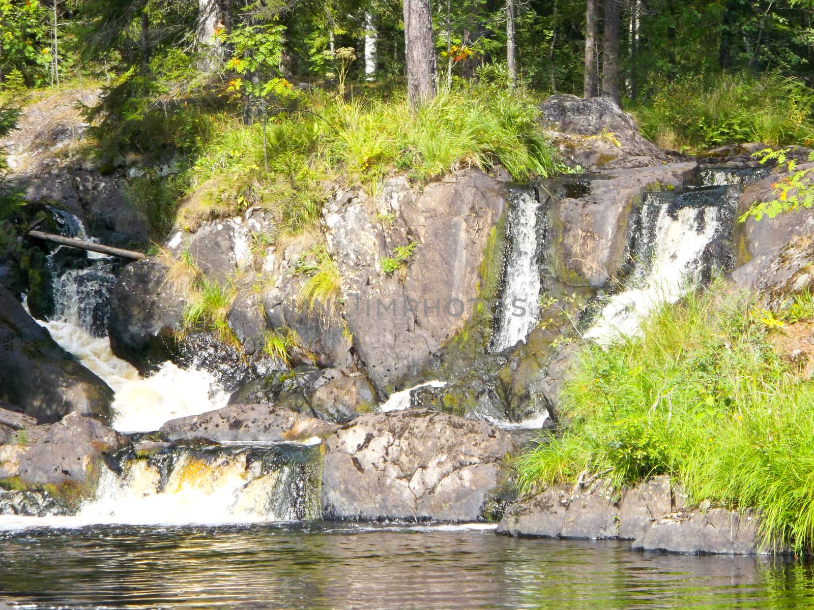 waterfall in the forest by rodakm