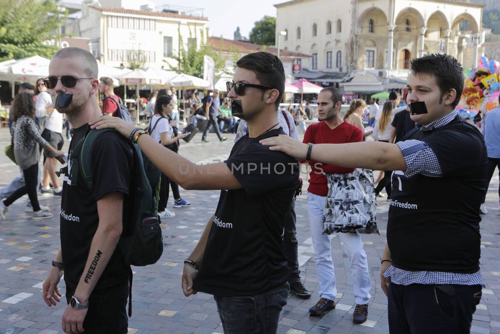 GREECE, Athens: Athens residents protest human trafficking by participating in the Walk for Freedom, a global initiative by the A21 Campaign, on October 17, 2015. The walk was one of several held worldwide by the organisation, which aims to raise awareness of human trafficking and provide support to survivors.  	