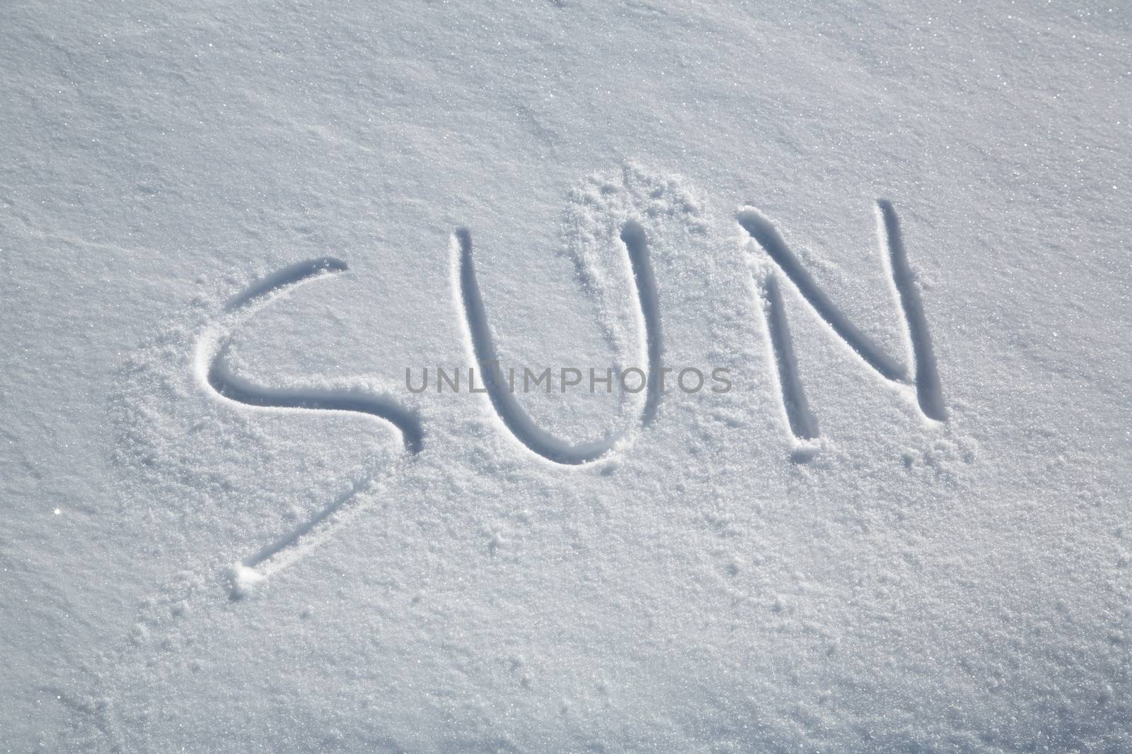 The word SUN written in the snow