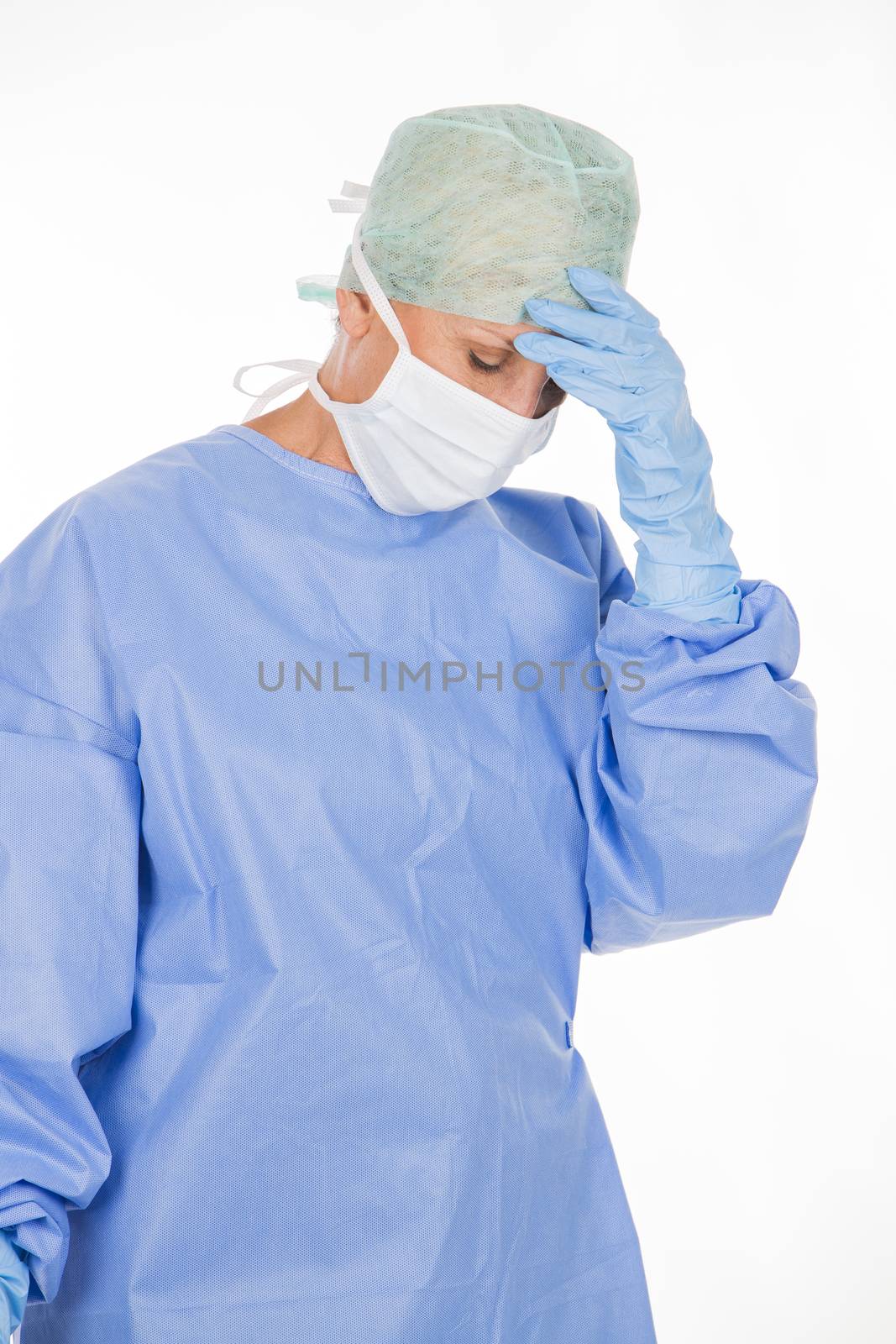 tired woman surgeon after a operation by Flareimage