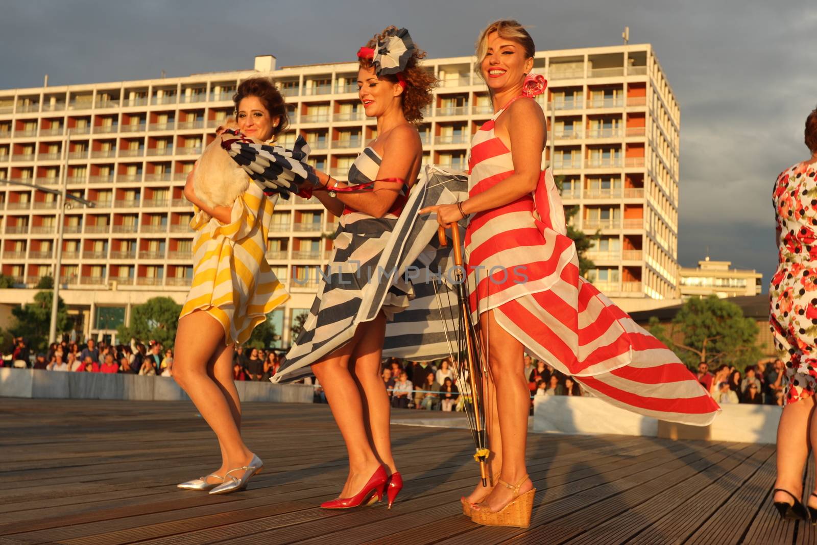 GREECE, Thessaloniki: A quirky outdoor fashion show with clothing made of recycled materials was held on the seafront promenade of Thessaloniki, northern Greece on September 28, 2015.	Professional designers, amateurs, fashionistas, architects and artists inspired by the city, the sea, the sky, the light and the colors of the New Promenade made unique creations from worthless items and recycled fabrics.